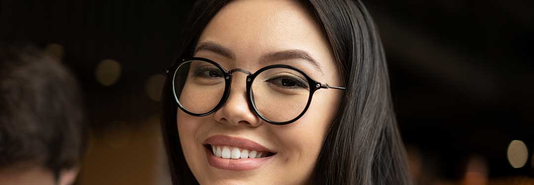 lady wearing glasses and reading